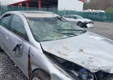 2007 Toyota Camry Hybrid из США, поврежденный, VIN JTNBB46K573000471